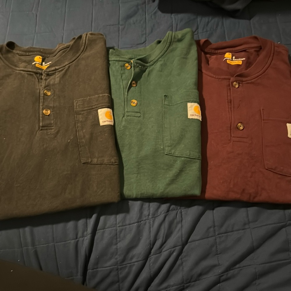 3 Carhartt men’s  long sleeve shirts (black-used, green NWOT, burgundy- NWOT)